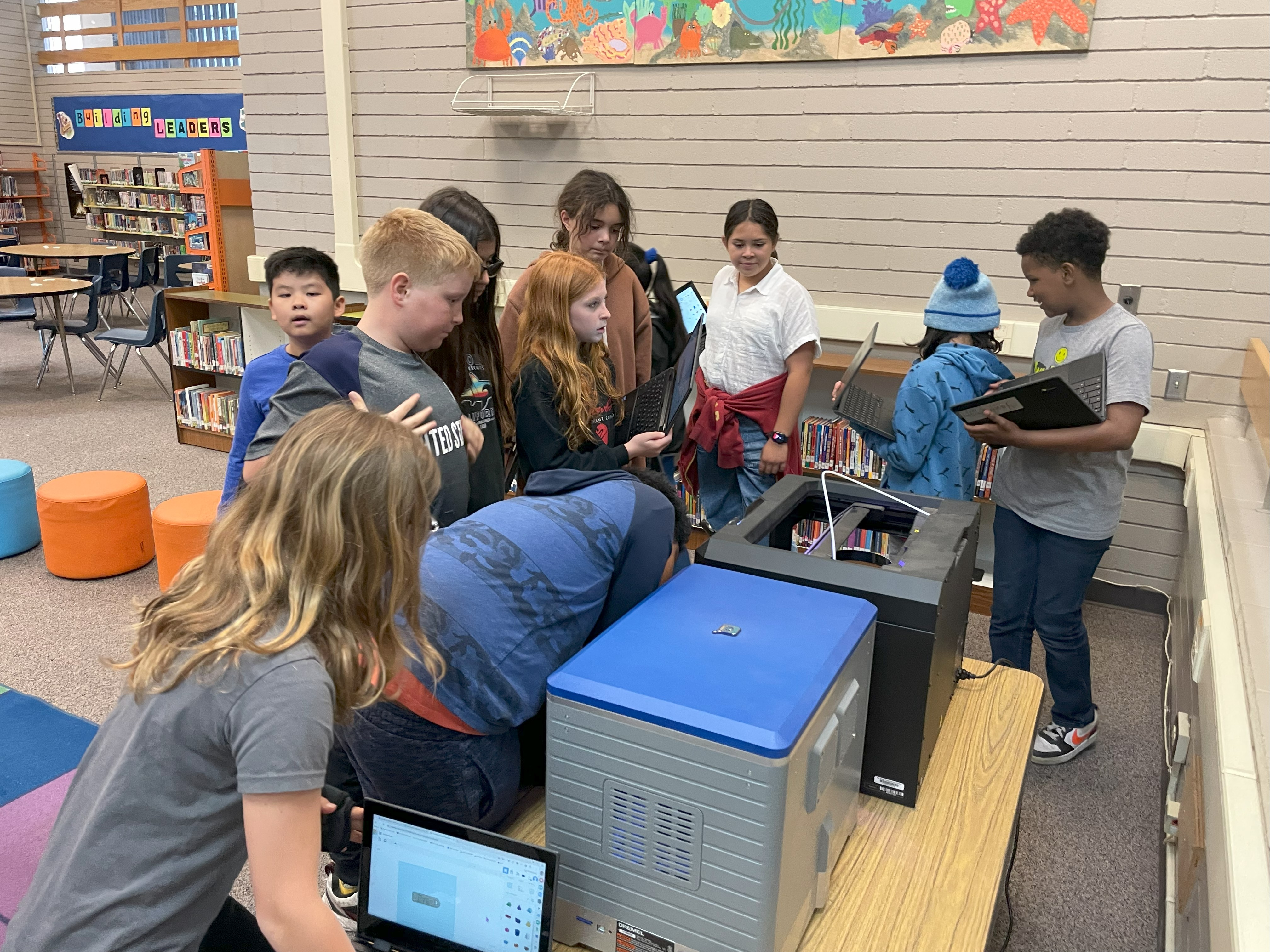 Students watching live printing